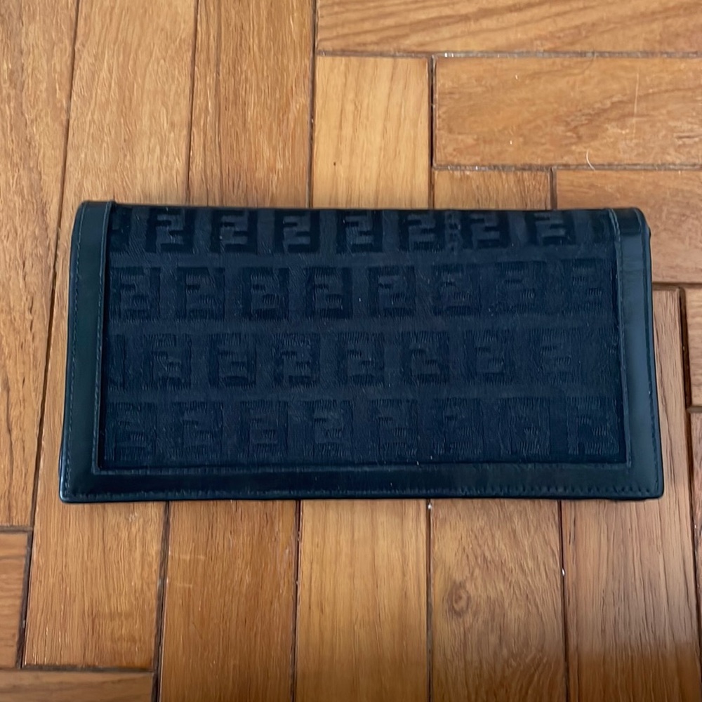 Black Fendi wallet in decent condition. Very little wear!